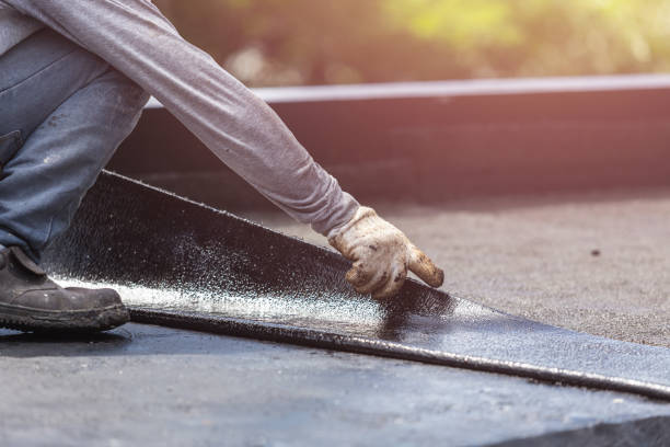 Professional Waterproofing technician working in Oakland, MD